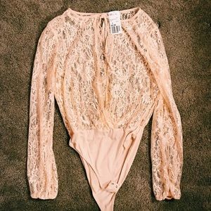 Lace pink body suit